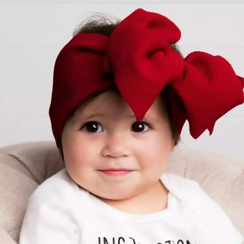 New-born baby's solid-colored bow headband