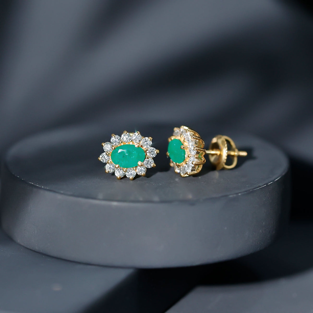 Natural 0.8 Carat Oval Cut Emerald and Diamond Earrings