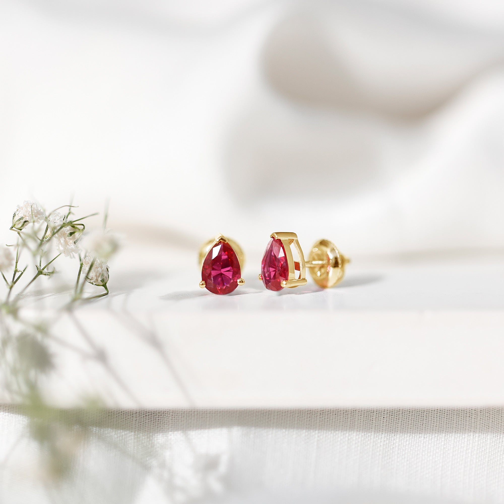 Solitaire 1.5 Carat Pear Shaped Lab Created Ruby Stud Earrings