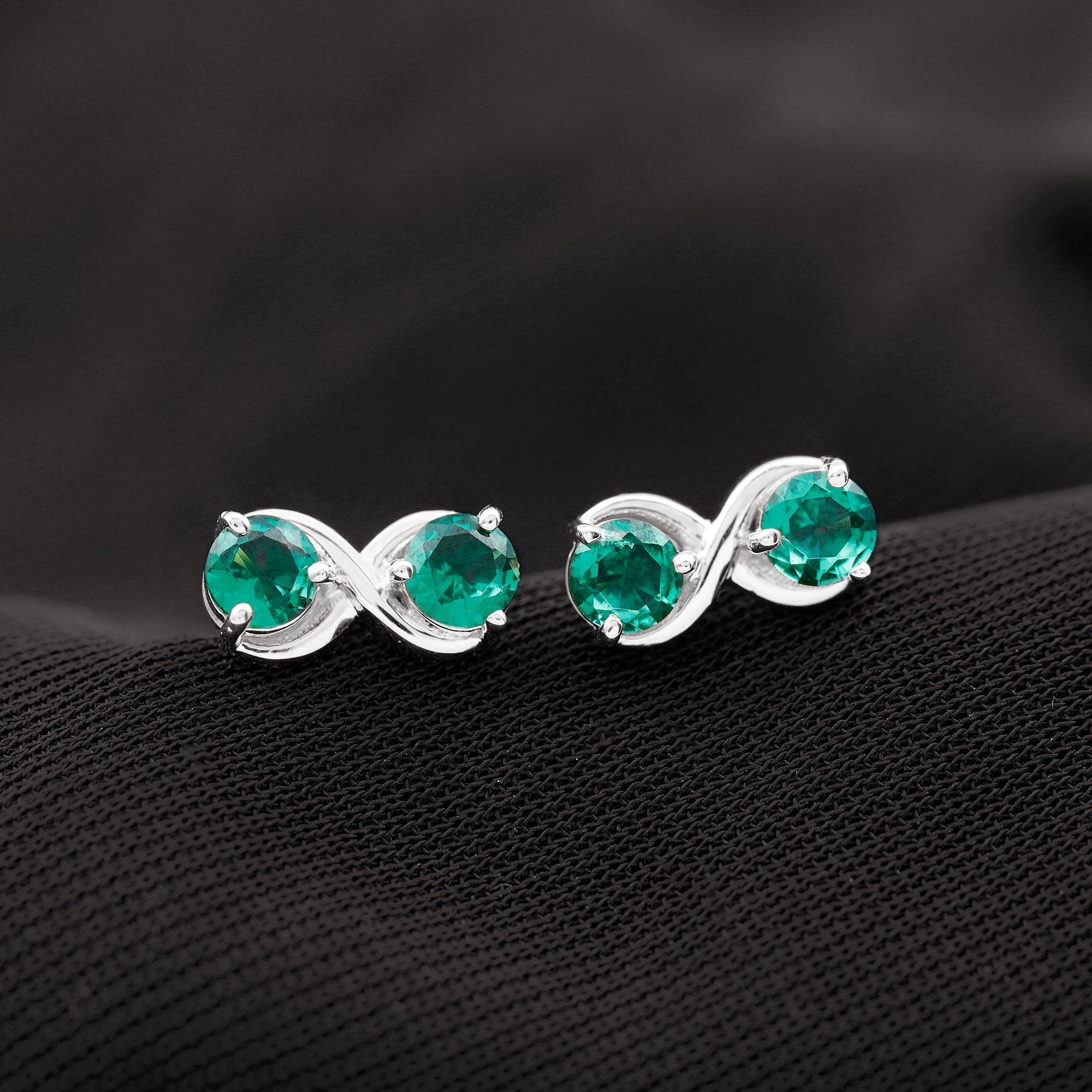 Lab Grown Emerald Infinity Stud Earrings