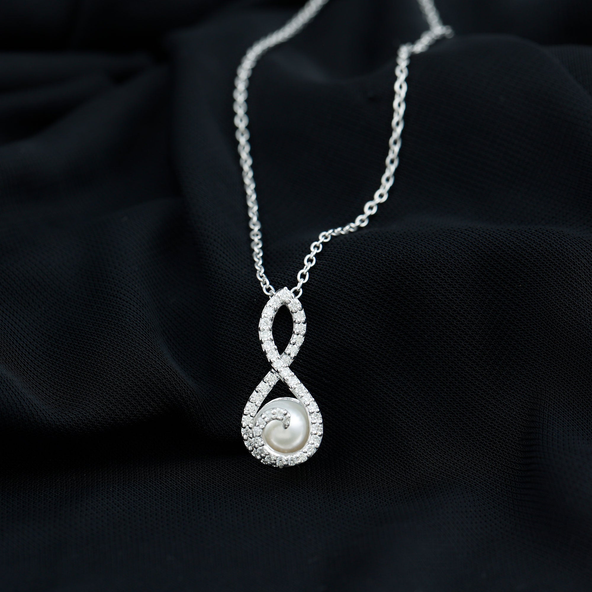 Freshwater White Pearl and Moissanite Infinity Pendant in Silver