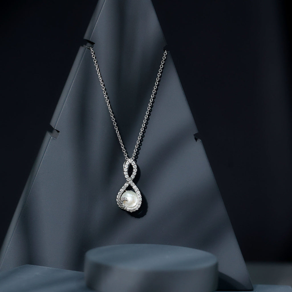 Freshwater White Pearl and Moissanite Infinity Pendant in Silver