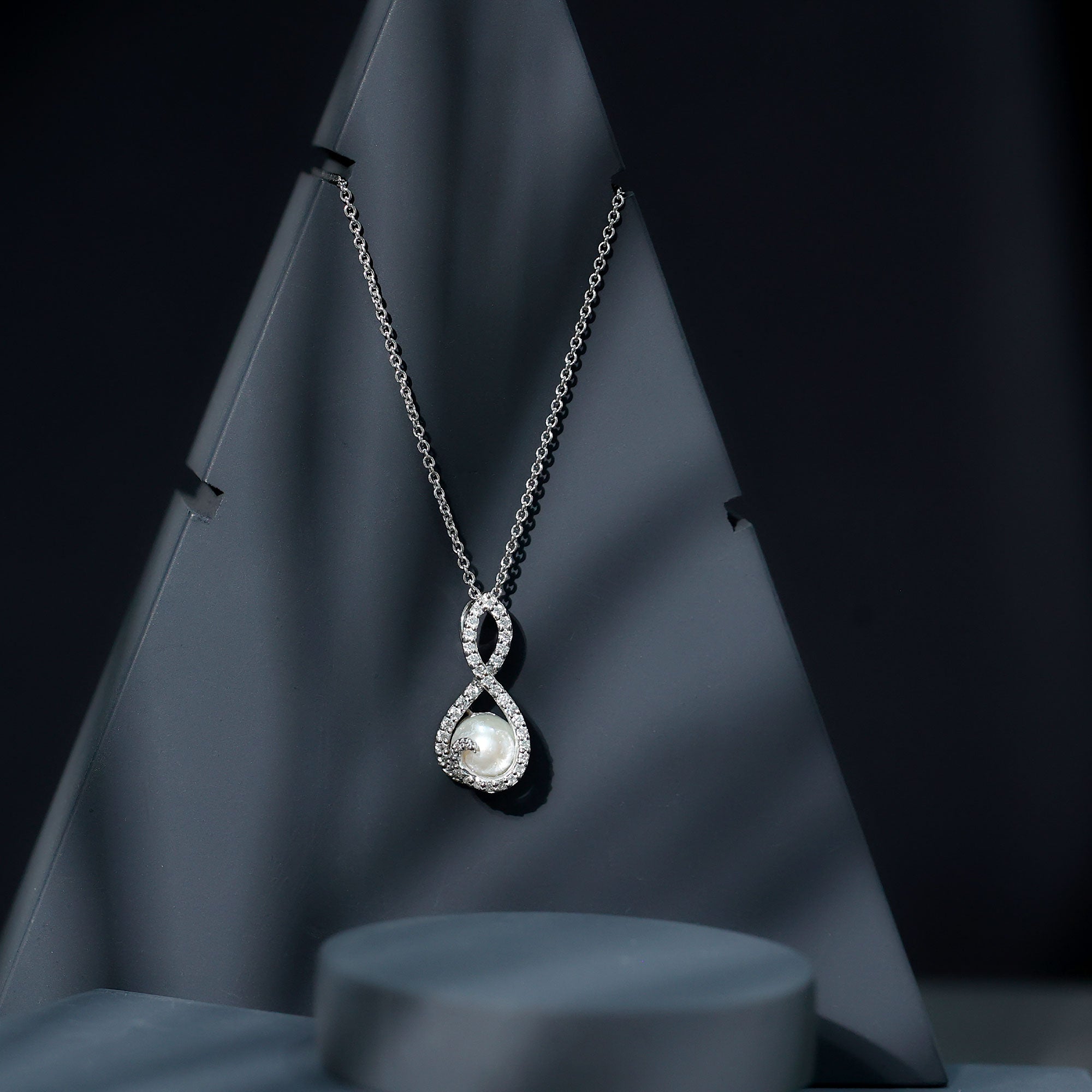 Freshwater White Pearl and Moissanite Infinity Pendant in Silver