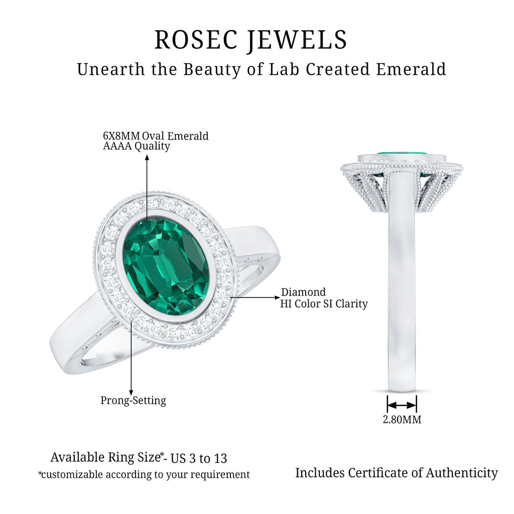 1.2 Carat Oval Lab Grown Emerald Bezel Set Engagement Ring With Diamond Halo