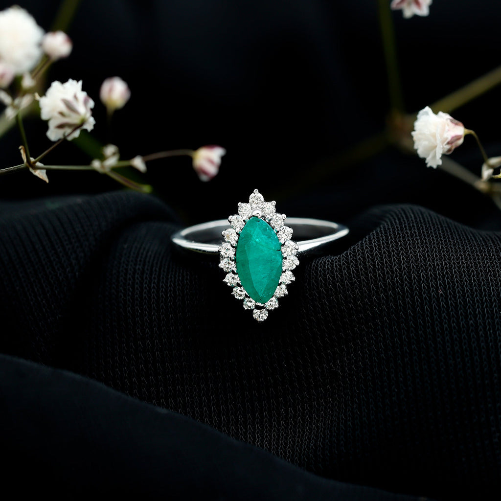 Elongated Marquise Cut Emerald Engagement Ring with Diamond Halo