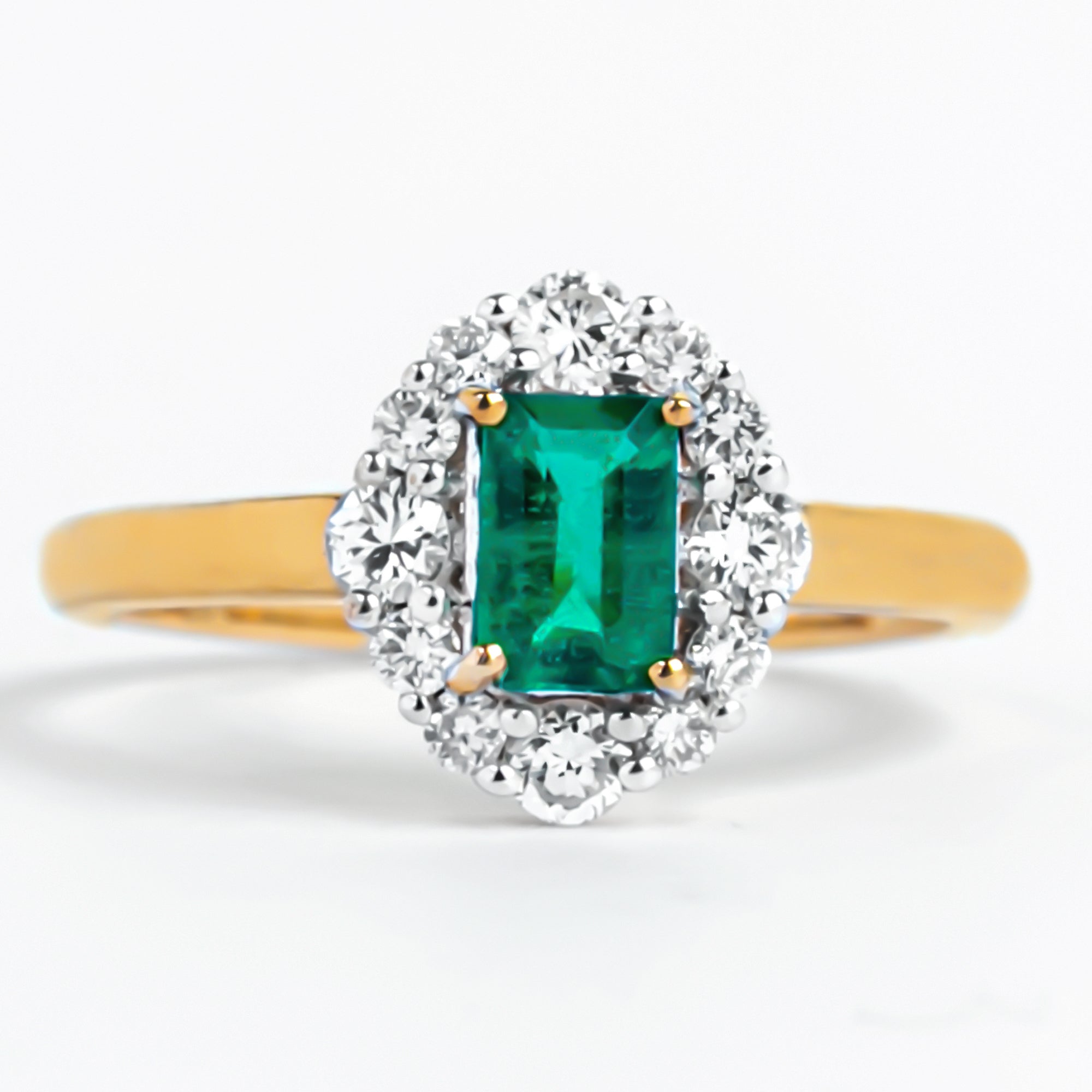 Classic Emerald Cut Emerald Engagement Ring with Diamond Halo