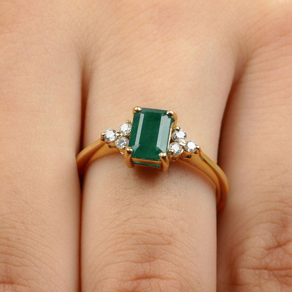 Octagon Cut Emerald Engagement Ring with Diamond Trio