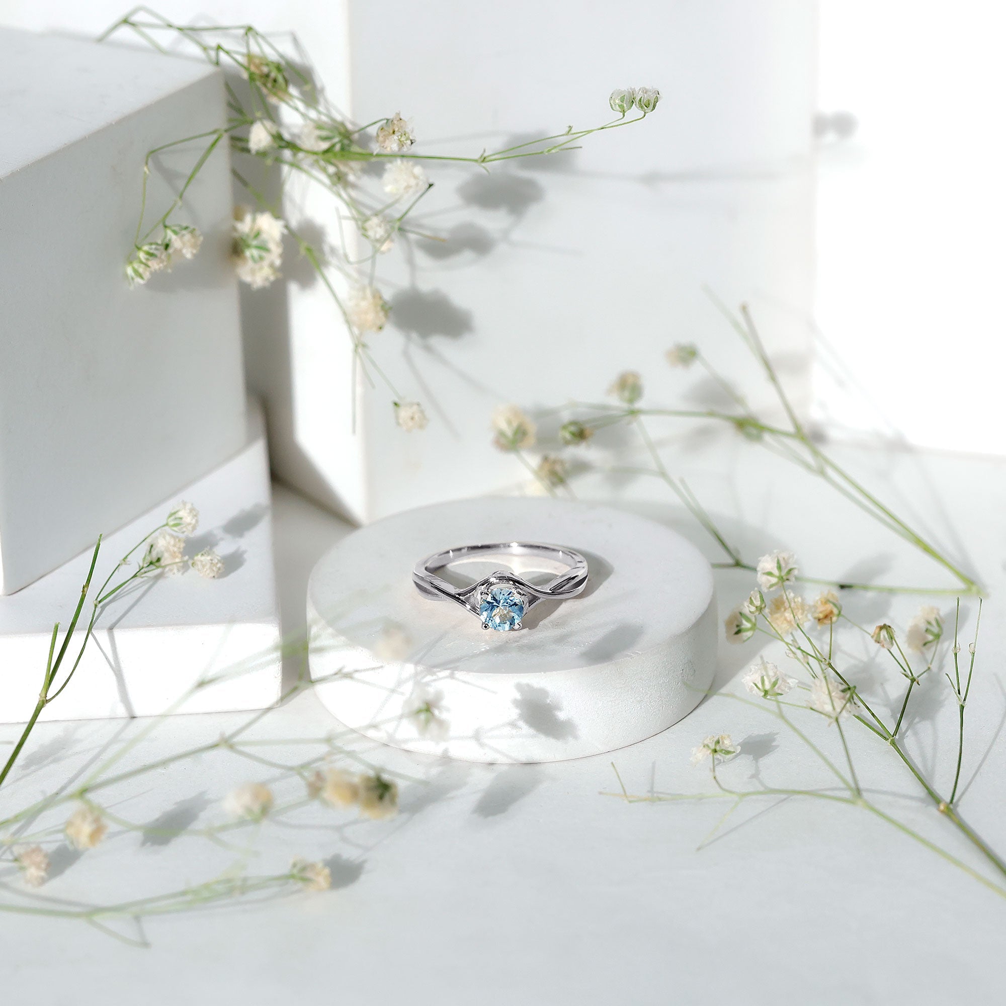 Solitaire Aquamarine Birthstone Ring with Crossover Shank