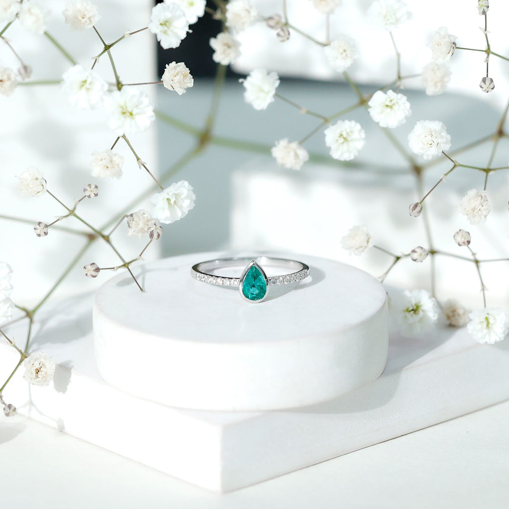 Pear Shaped Emerald Engagement Ring with Diamond Side Stones