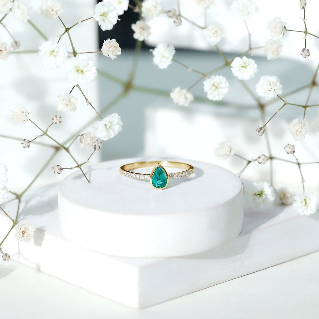 Pear Shaped Emerald Engagement Ring with Diamond Side Stones