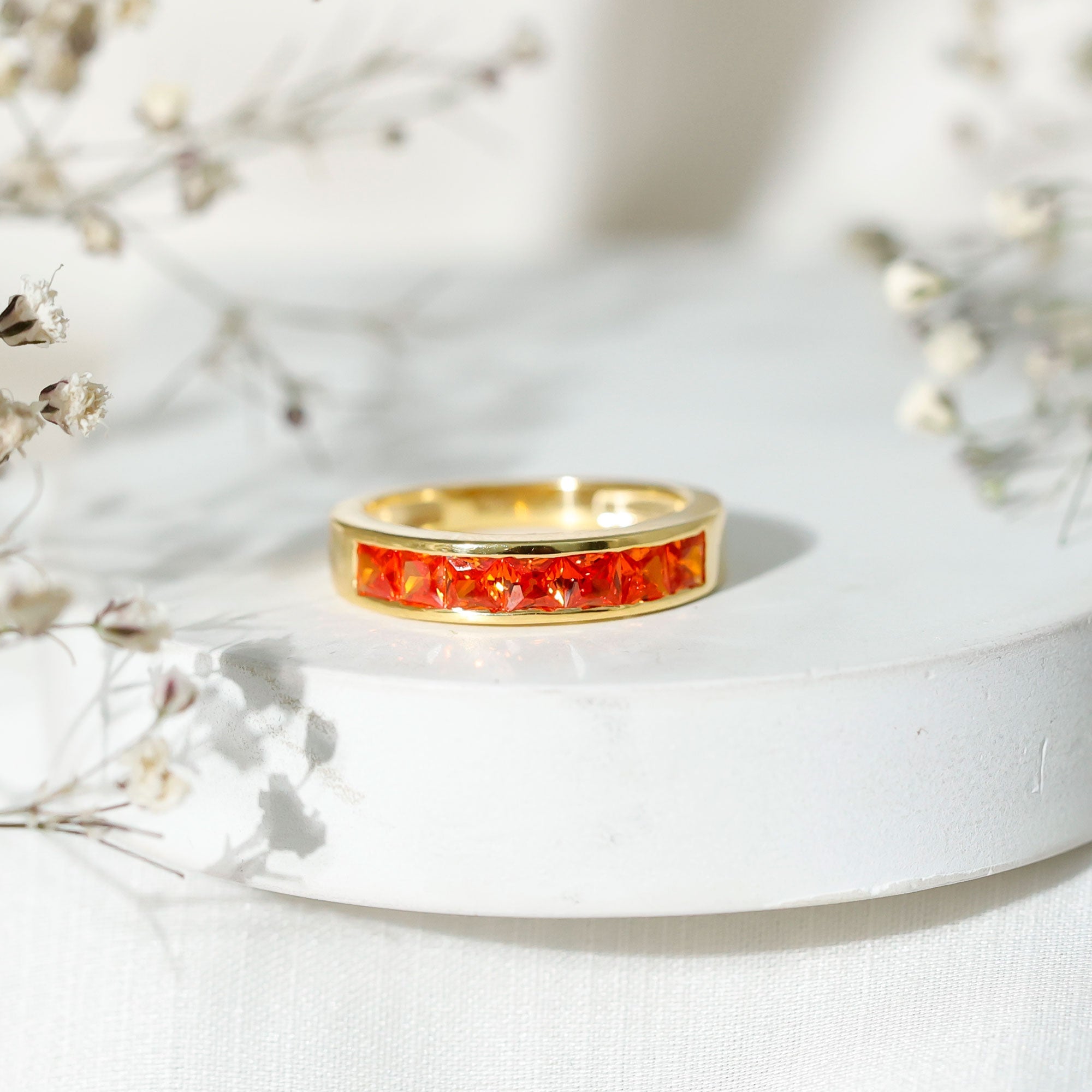 Princess Cut Lab Grown Orange Sapphire Half Eternity Band in Channel Set