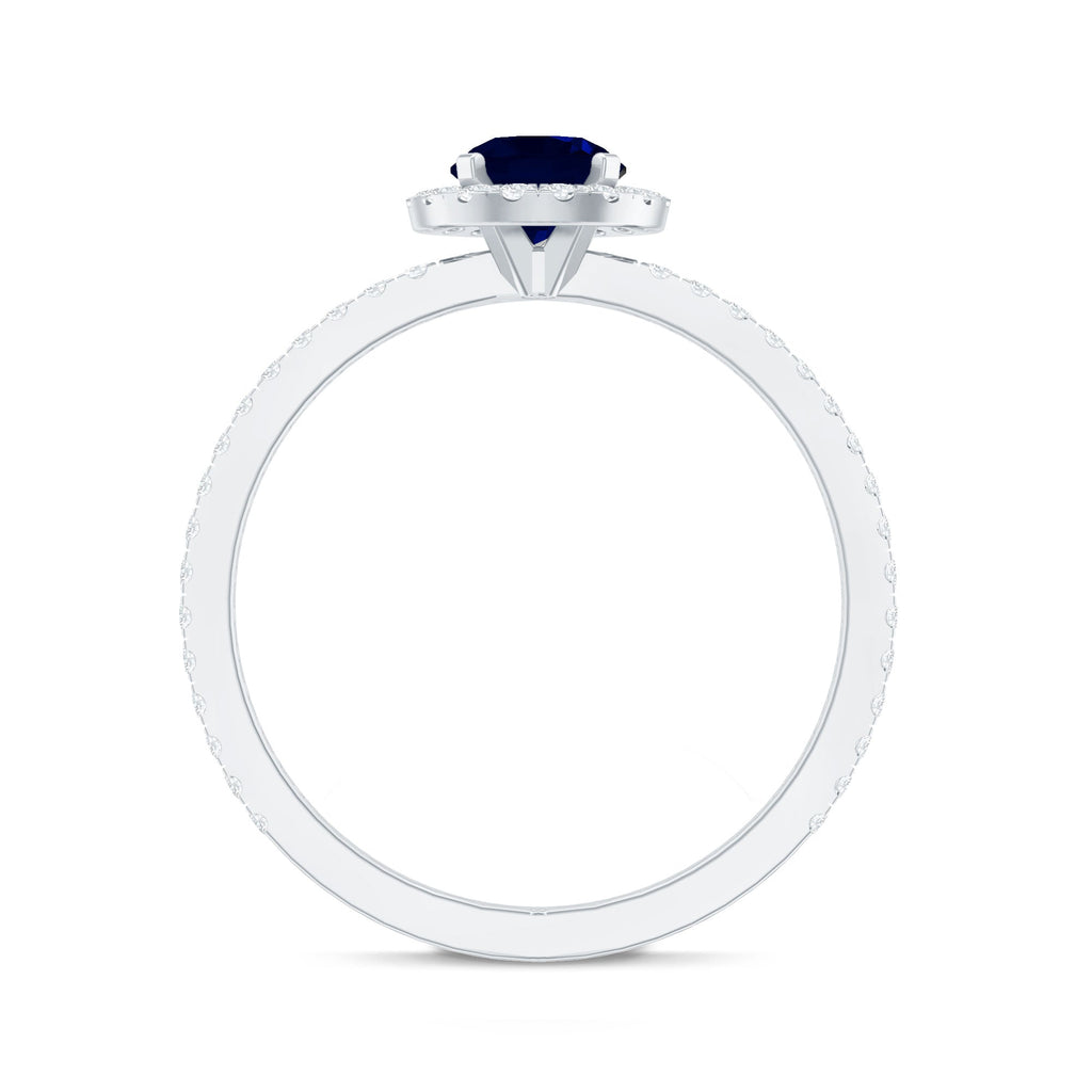 0.95 Carat Round Blue Sapphire and Diamond Halo Engagement Ring