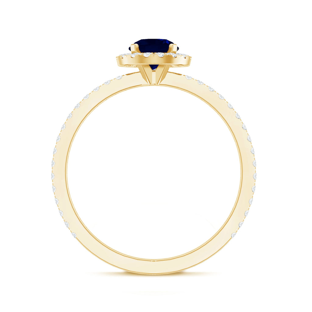 0.95 Carat Round Blue Sapphire and Diamond Halo Engagement Ring