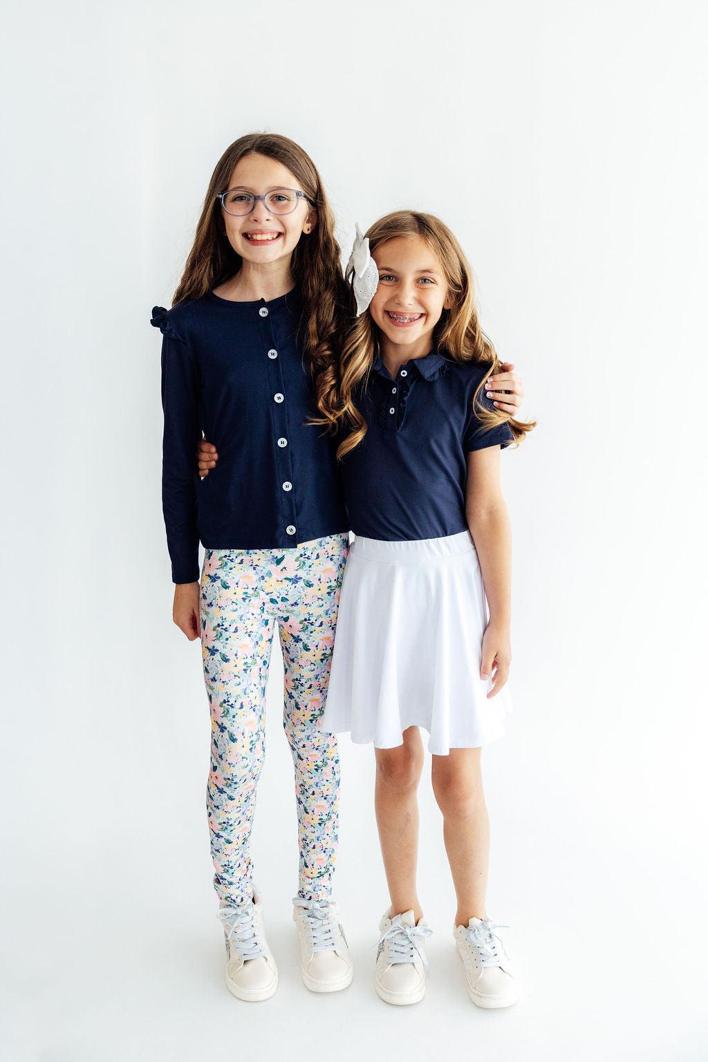 Navy S/S Ruffle Polo Mila & Rose ®