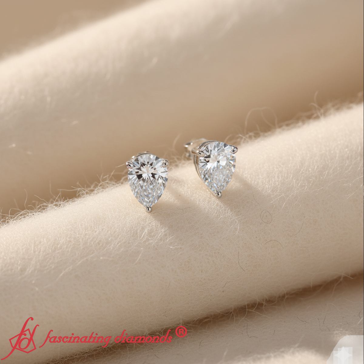 Three-Prong Pear Diamond Solitaire Stud Earrings [IGI Certified]
